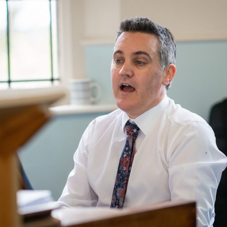 man in a chapel