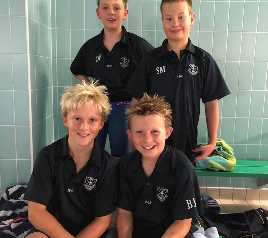 students dressed after a swimming lesson