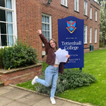 student happy with her exam results