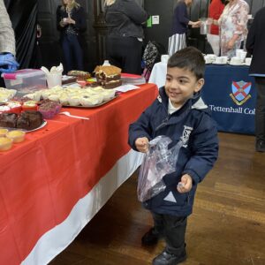 little boy holding money