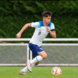 Pupil playing football