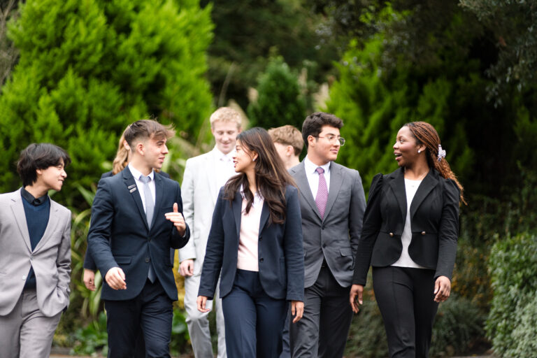 a group of sixth form students walking and talking